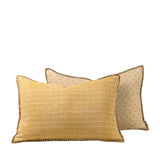 Two decorative pillows with different patterns 